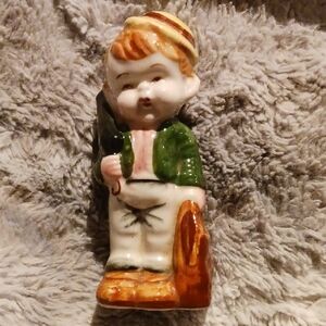 Vintage Ceramic Figurine with Green Jacket